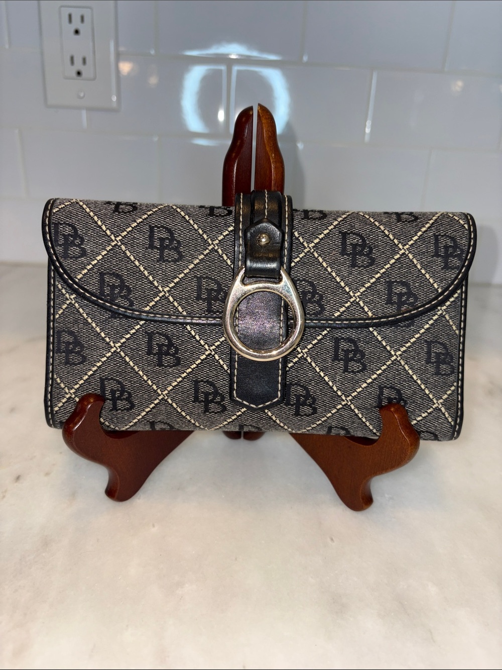 Dooney & Bourke signature logo patterned wallet & checkbook holder Clutch